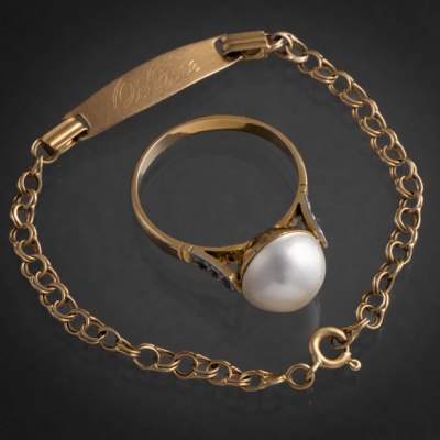 Conjunto de anillo y pulsera en oro amarillo de 18 kt.