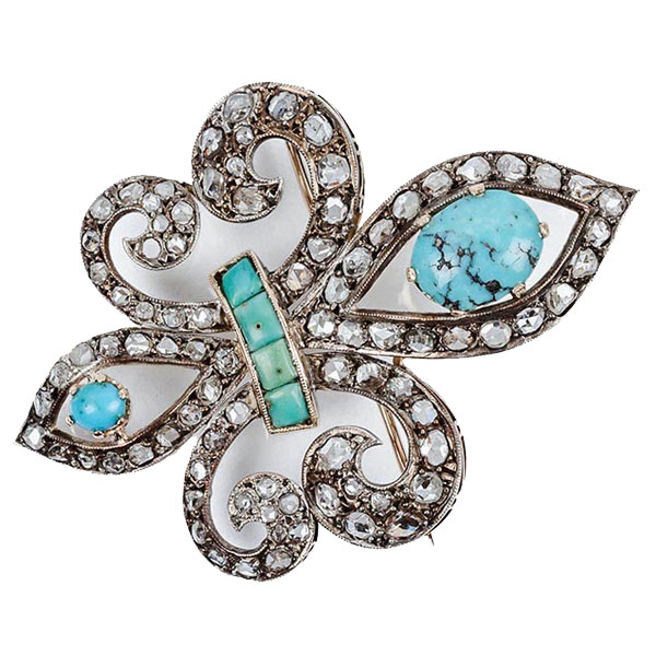 Alfiler-colgante vintage en doble 'flor de lis' decorado en filas de diamantes simples y centros de turquesas naturales. Montura en oro amarillo y vistas de plata