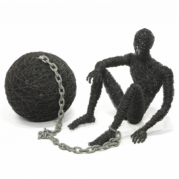 Escultura metálica "Hombre con grilletes", s.XX. 