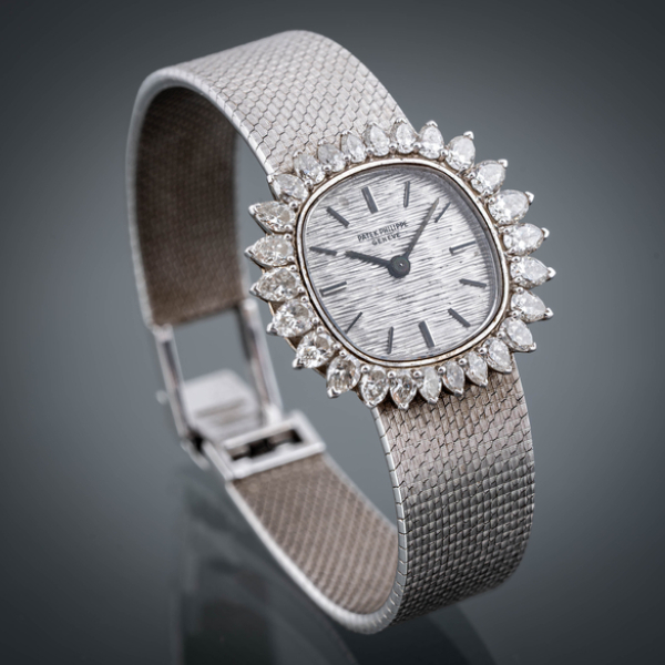 Patek Philippe, Reloj vintage en oro blanco de 18kt con orla de brillantes.