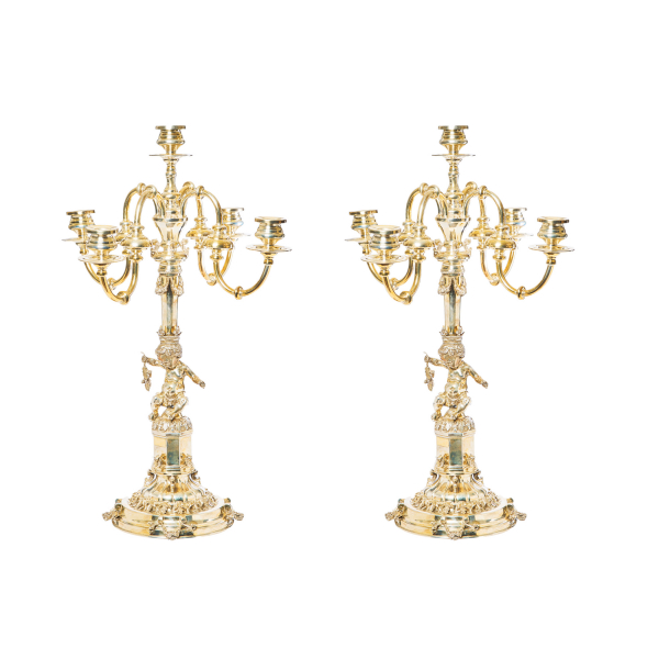 Pareja de candelabros de cinco luces en plata punzonada 925  s.XX.