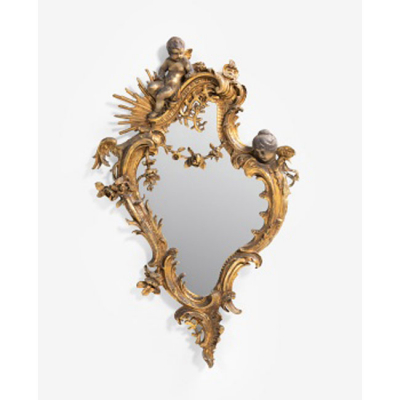Espejo en madera y estuco dorado con decoraci&oacute;n de &aacute;ngeles, rocallas, flores y hojas. Estilo Luis XVI.   &Eacute;poca: S. XIX