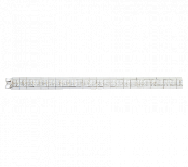 Brazalete de pavé de brillantes con diseño de banda artículada, con línea central de brillantes entre dos franjas de oro liso. 