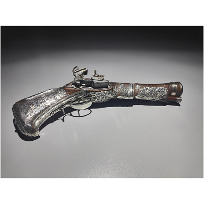 Pistola Trabuco de cinturón Miquelet - Lock ornada en plata mexicana, Nueva España, siglo XVIII.