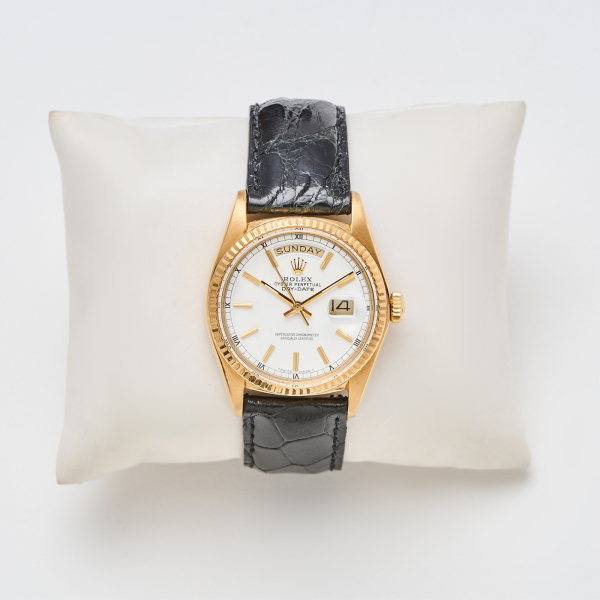 ROLEX. Oyster Perpetual Day-Date. Reloj de pulsera para caballero, c.1976. En oro y correa de piel  