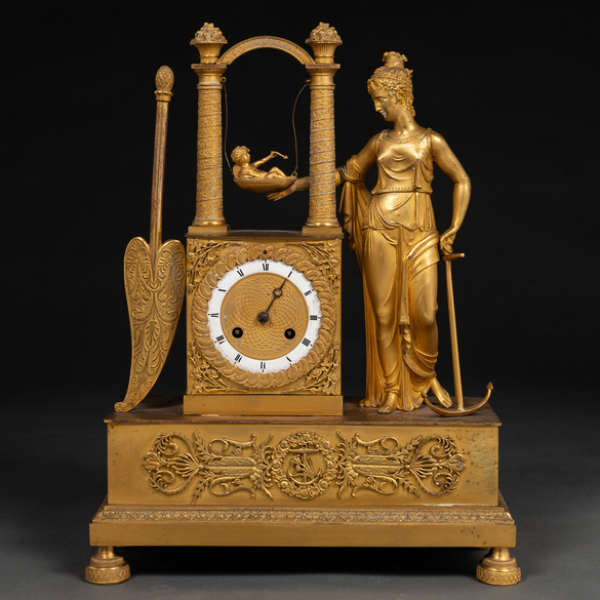 "Alegoría del Amor" Reloj de sobremesa francés época Imperio en bronce dorado al mercurio. Trabajo Francés, Siglo XIX