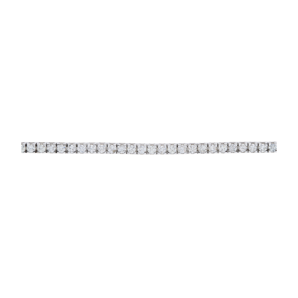 Pulsera rivière en oro blanco con diamantes talla brillante engastados en garras. Peso diamantes: 3,5 ct. aprox.