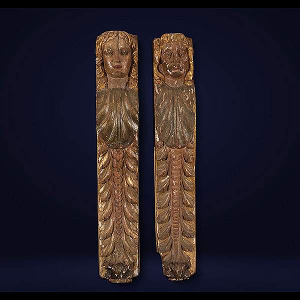 Escuela Italiana del siglo XVI - Pareja de Cariatides policromadas.   Madera tallada y policromada.