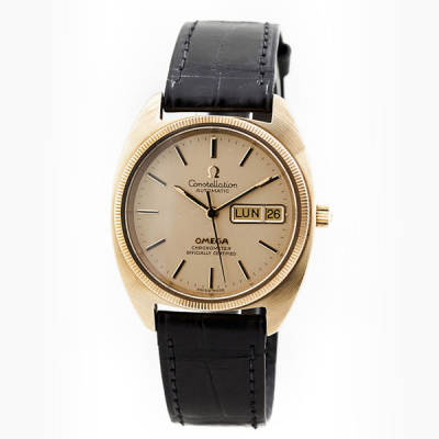 Reloj vintage, cab., suizo, OMEGA Constellation Automatic en oro amarillo y piel