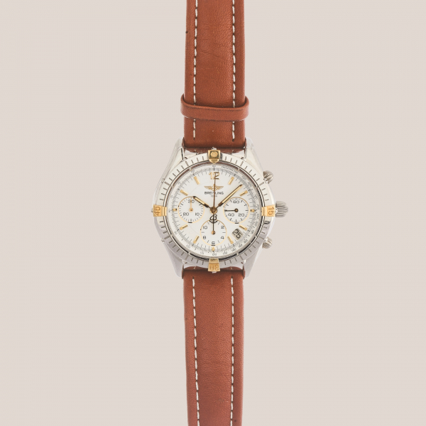BREITLING «Cronomat GMT». Reloj de pulsera unisex. En acero y oro con correa de piel. Reedición 1990.