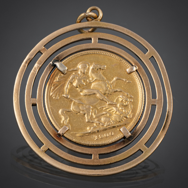 Colgante circular en oro amarillo de 18kt con moneda de la Reina Victoria en el interior del a&ntilde;o 1900
