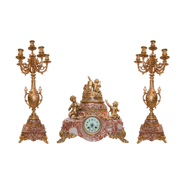 Reloj de sobremesa francés con guarnición de candelabros de seis luces en bronce dorado y mármol, fles. del s.XIX.