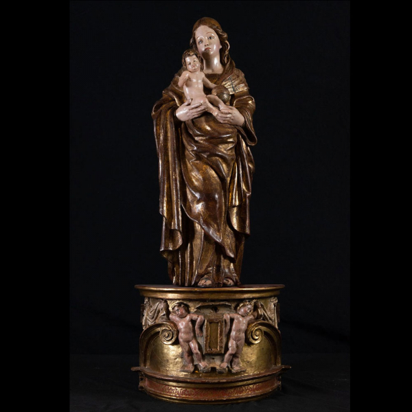 Espectacular "Virgen con Niño en brazos" en madera de talla, escuela Romanista del siglo XVI.