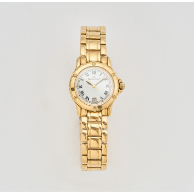 MAURICE LACROIX. Reloj de pulsera para señora. En oro.  