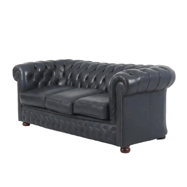 Sofá Chesterfield de tres plazas de la manufactura Winchester en piel de tonalidad azul marino, fles. del s.XX.