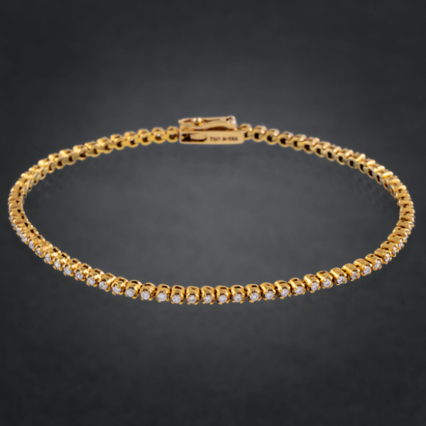 Pulsera Riviere en oro amarillo de 18 kt con diamantes talla brillante.