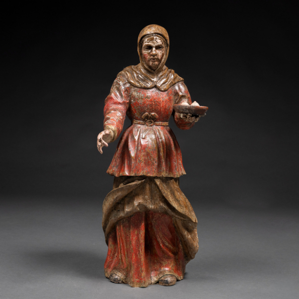 "Santa Agueda" Escultura en madera tallada y policromada. Siglo XVIII