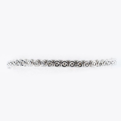 Pulsera &#039;rivière&#039; en oro blanco 18 K y limpios y blancos diamantes talla brillante en chatón